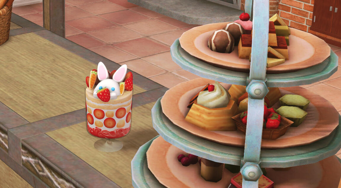 A close-up of a rolanberry parfait with a meringue bunny on top, a three-tiered tray laden with small cakes and chocolates.